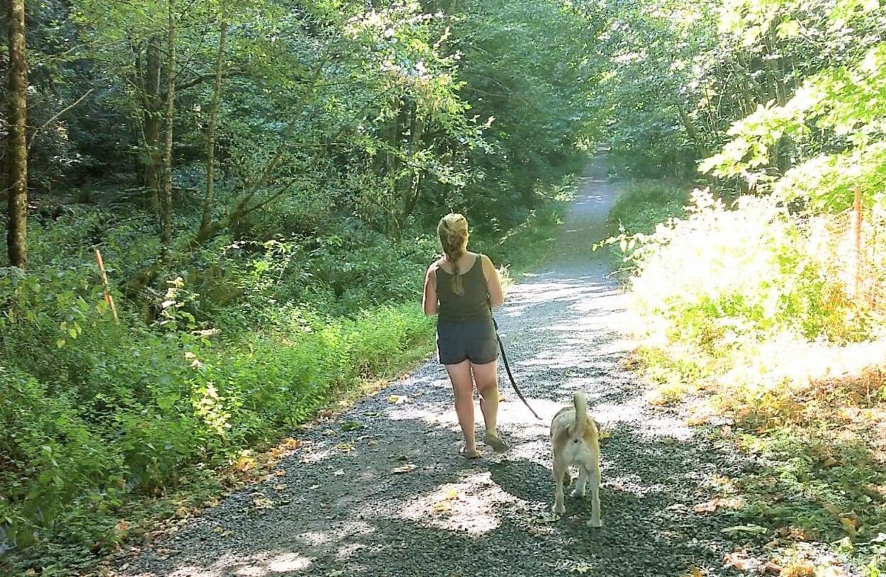 A photo of treasure and Allison walking - a story about pet love and pet loss.